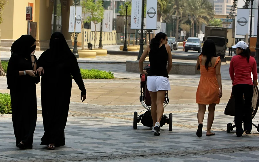 People walking along a street in Dubai